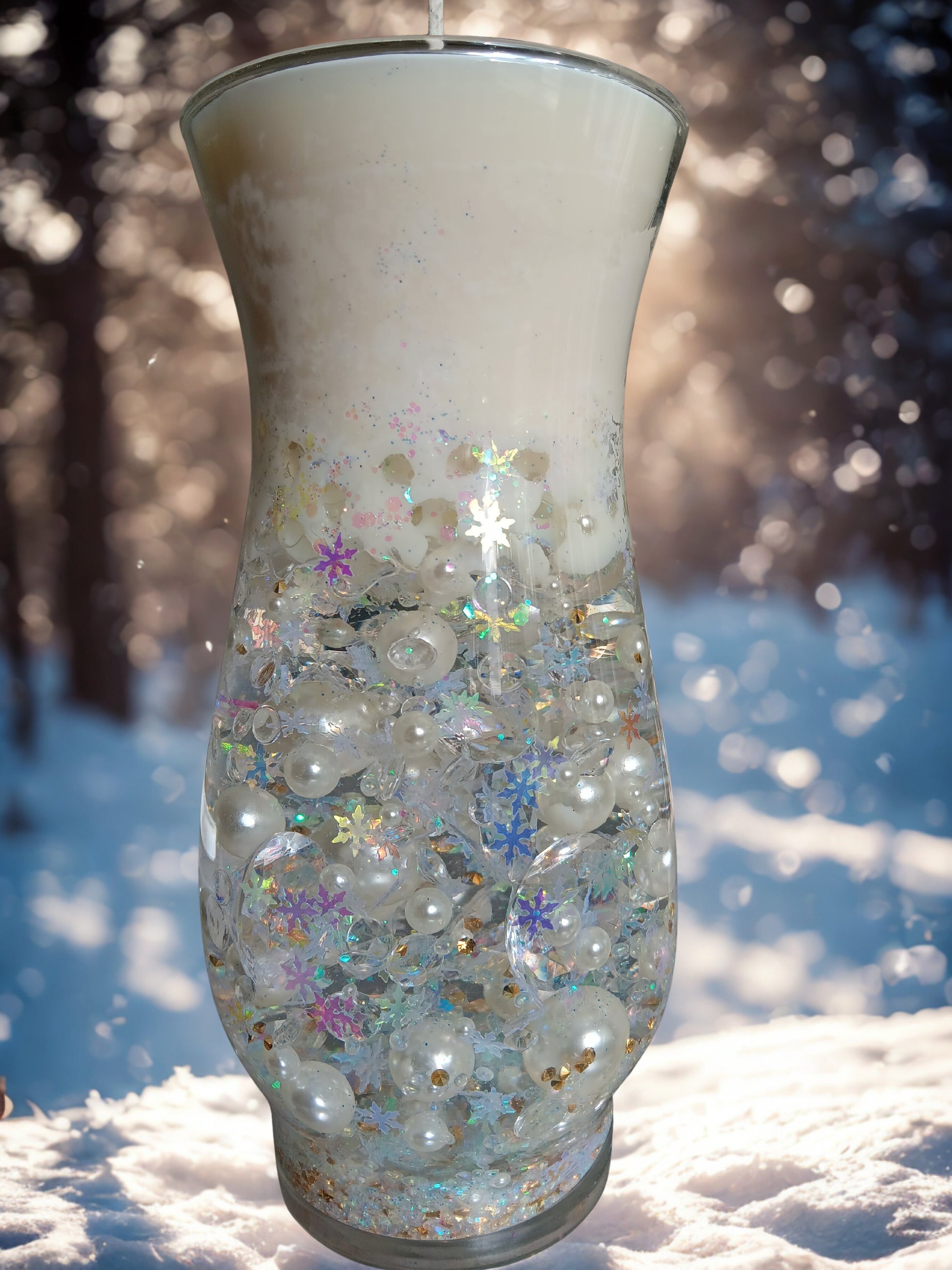 Decorative winter candle in a curved vase with shimmering silver and crystal accents, hand-poured soy wax top, created by Chaos Candles.