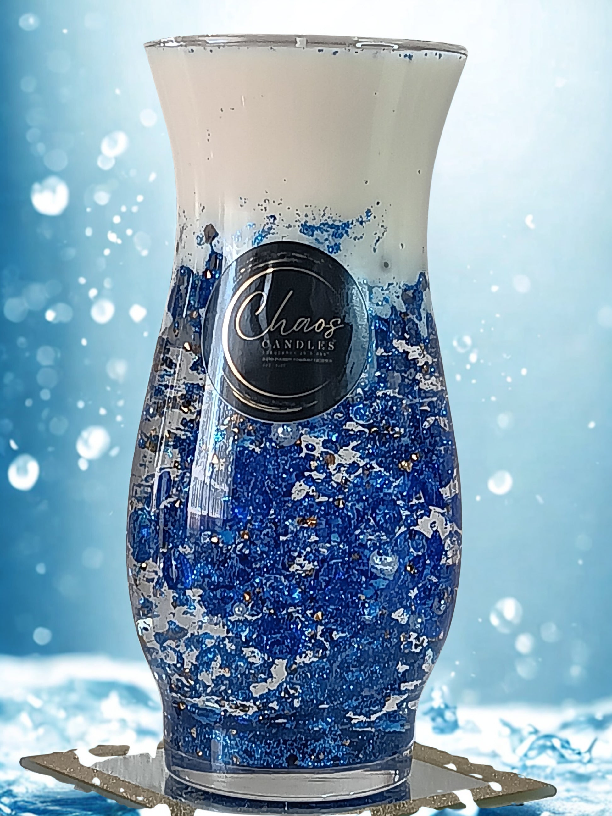 Blue Curve luxury soy candle sealed in an hourglass vase with crystals and glitter – hand-poured by Chaos Candles in California