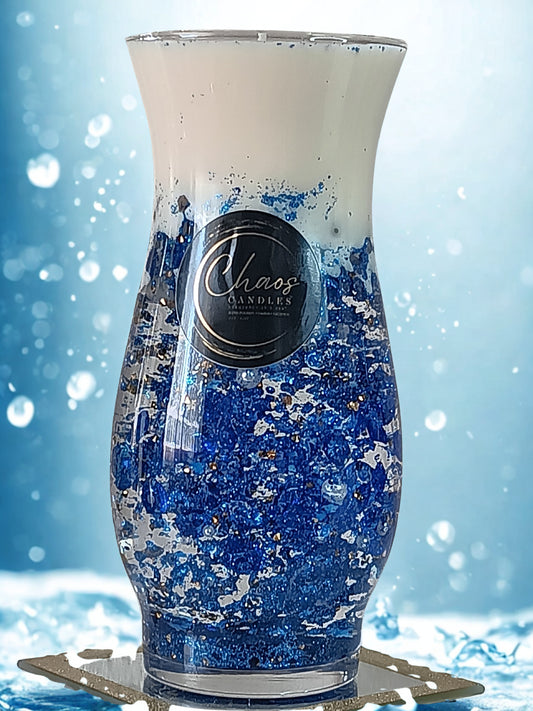 Blue Curve luxury soy candle sealed in an hourglass vase with crystals and glitter – hand-poured by Chaos Candles in California